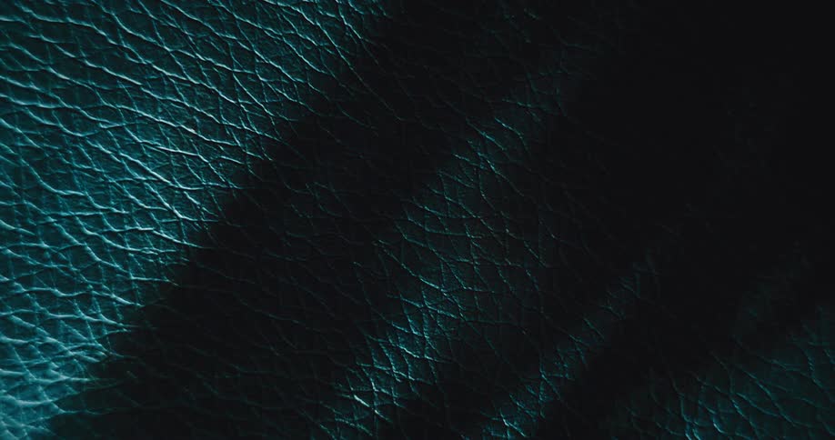 Light is reflecting on a blue leather