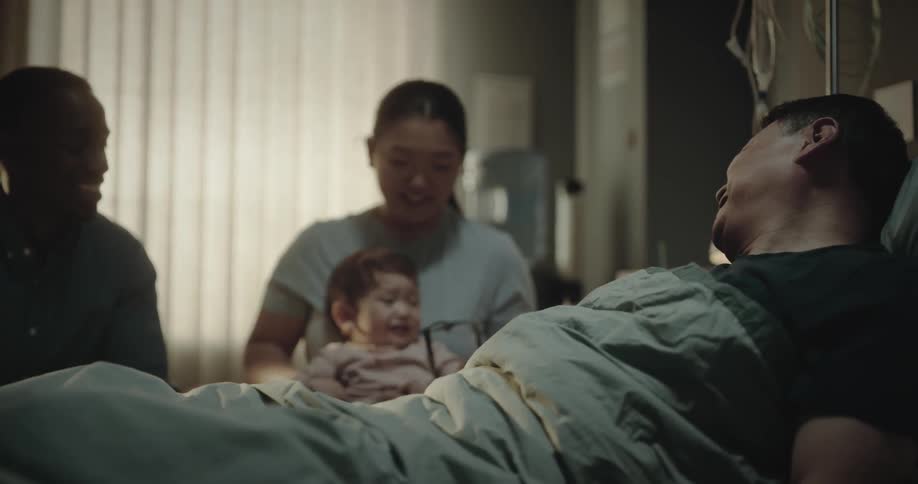 People visiting a patient in the hospital