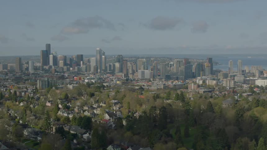 The city ahead has very tall buildings