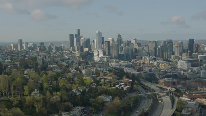 A large city has many tall buildings ahead