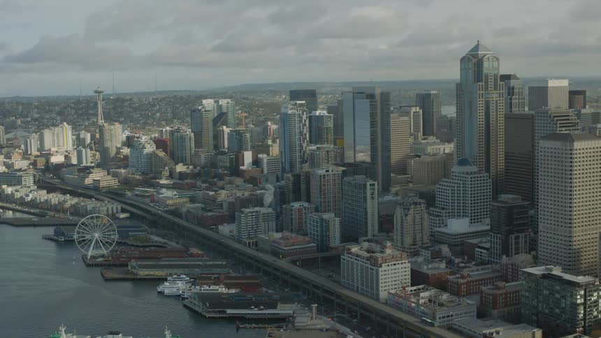 The coastal city has many tall buildings