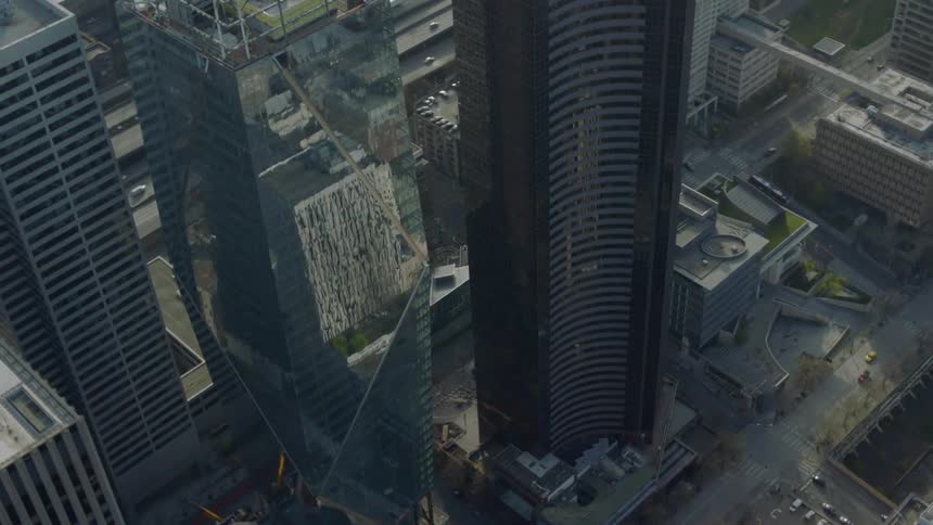 Tall buildings have reflective windows below
