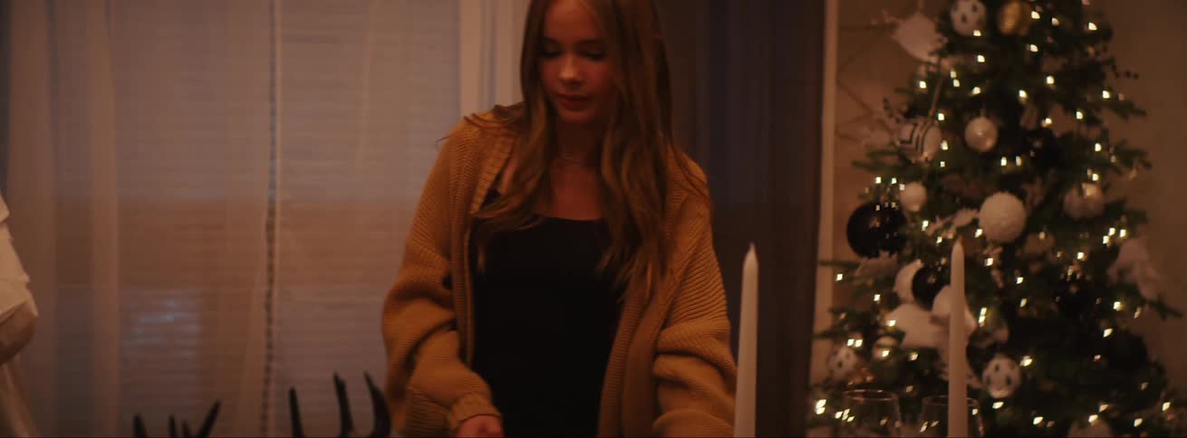 A clip of teenagers setting up the table for a feast