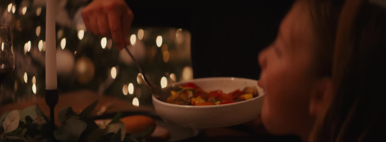 Family having dinner at a festive christmas table