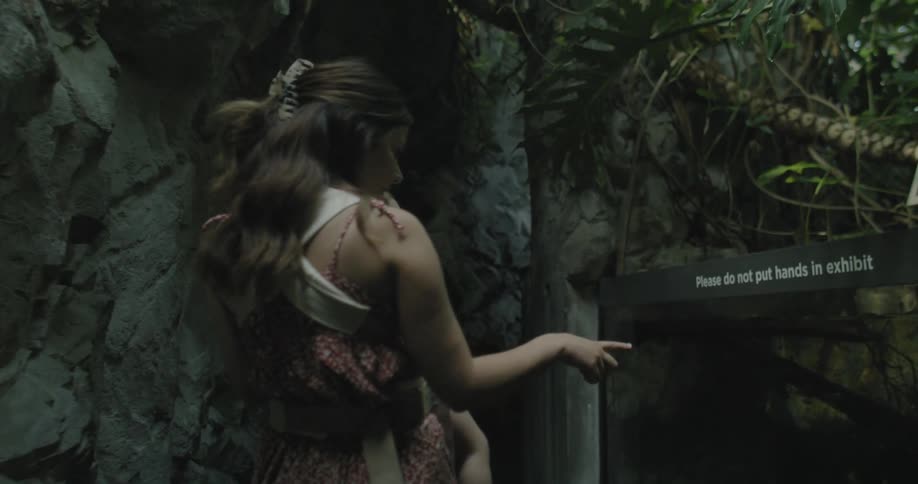 Mother walking with her baby daughter in her arms in a natural area