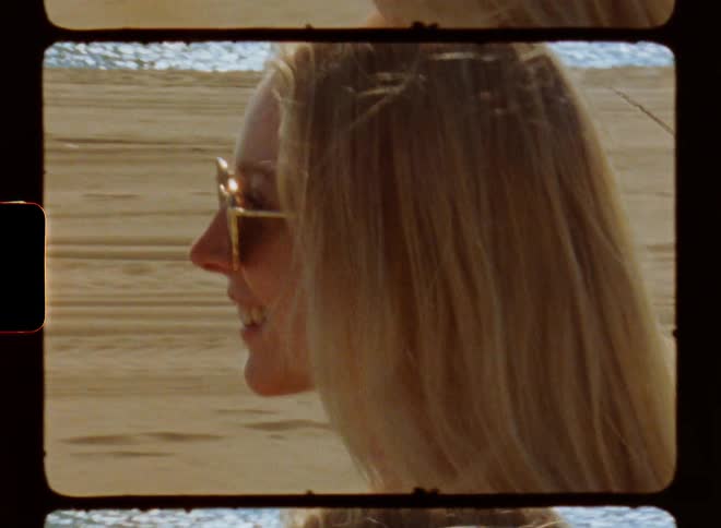 Portrait of a blonde woman at the beach