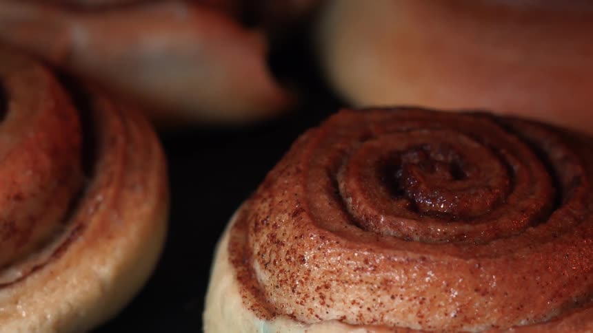 Extreme closeup of small sweet pastries in slices being baked