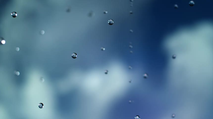 Slowmotion footage of water droplets falling