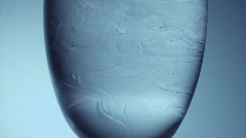 Close up of ice cube in water