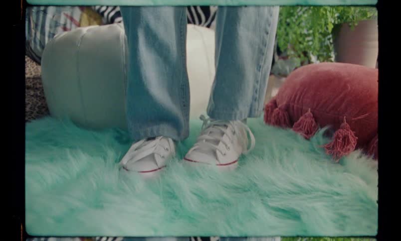 Close up on a persons legs beneath jeans