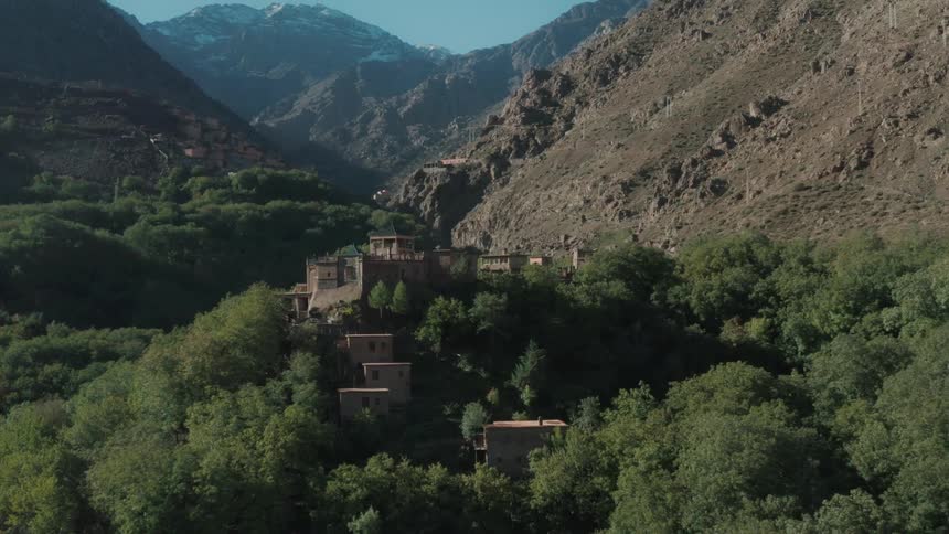 Hamlet nestled amid mountains and trees