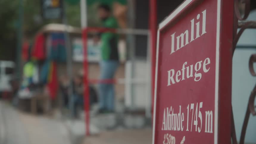 Sign placed near road identifies imlil refuge and its altitude
