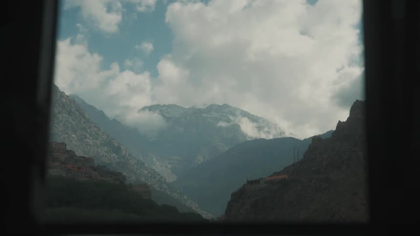 Mountain range and a cloudy sky at sunset