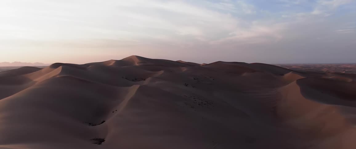 A region with huge sand dunes and columns
