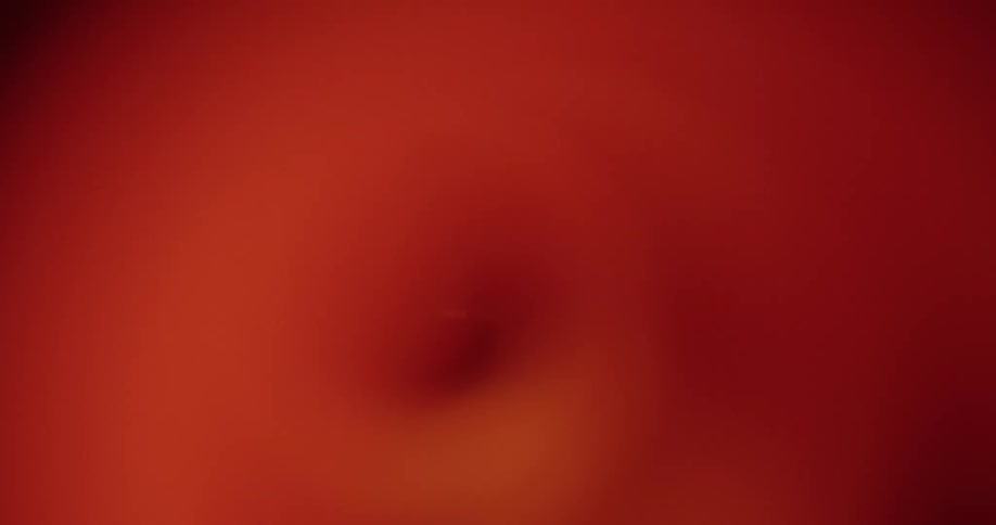 A light passes through a tunnel that is dark