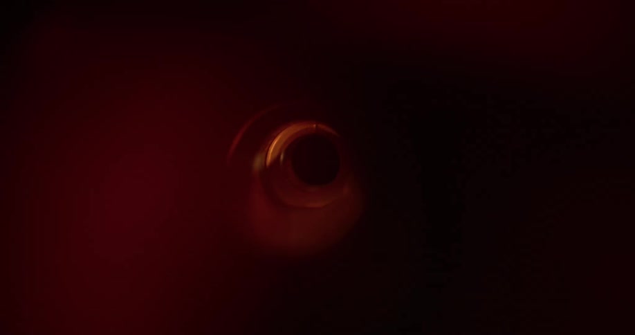 A light passing quickly through a tunnel with a black end
