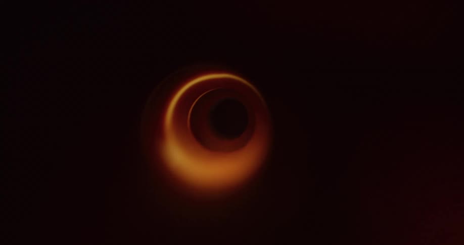 View from inside an abstract funnel with reflections of external lights creating shadows