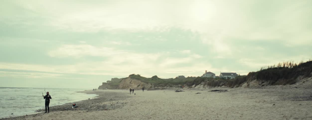 People enjoy the beach at morning