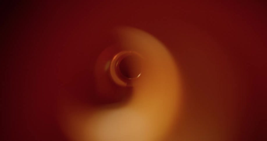 Bright light illuminates interior of tube