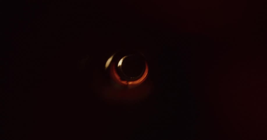 Reflection of light passing through an abstract funnel