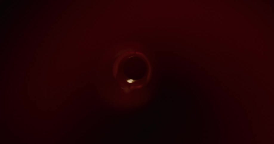Light illuminates inner walls leading to hole