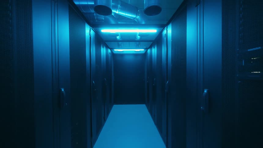 Lights turning on in a narrow corridor