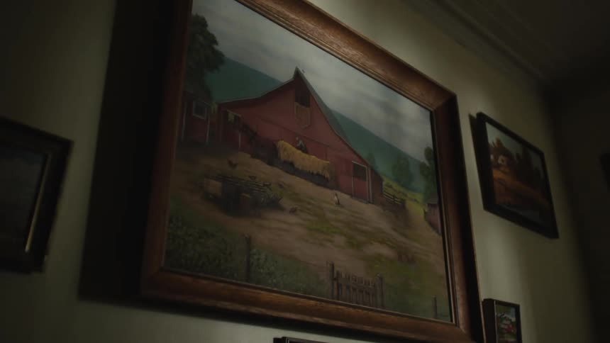 An artistic painting in a frame on a wall