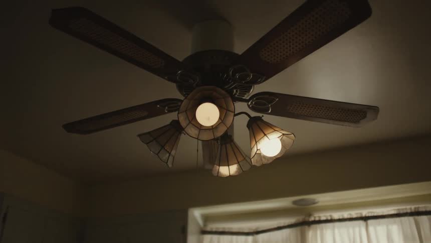 A ceiling fan in the living room flickers intermittently
