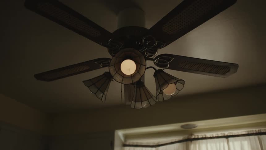 A ceiling fan in the living room flickers intermittently