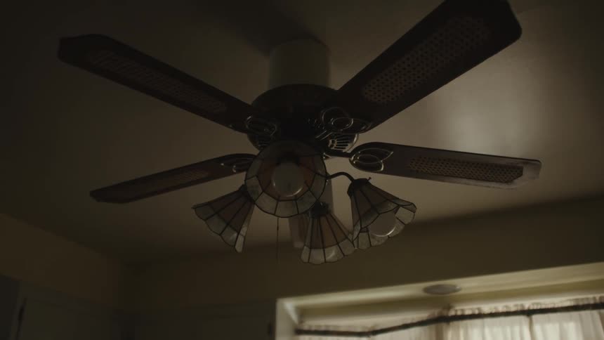 A ceiling fan in the living room flickers intermittently