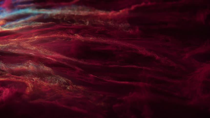 Close up of an abstract red liquid flowing down