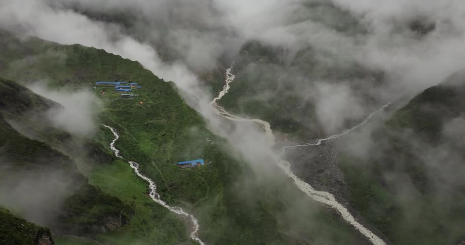 An aerial view of a community in a forest