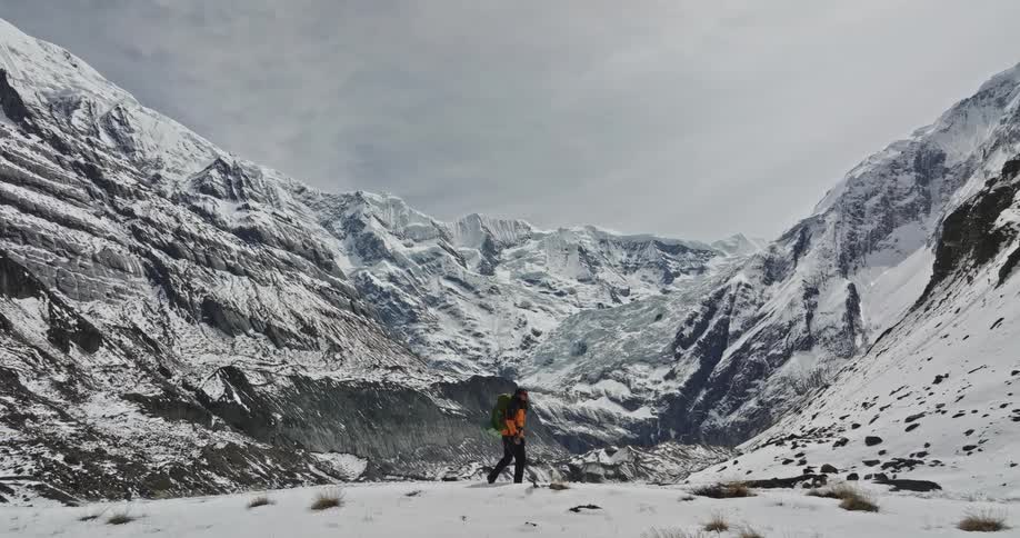 A person hiking the ice mountain