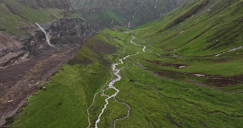 Aerial of the stream on a mountain during the day