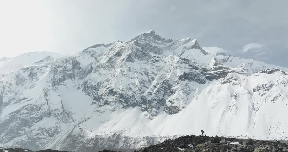 A person is hiking on the mountains