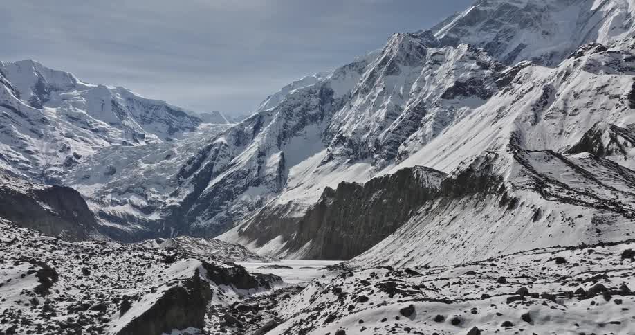 The mountain range is covered in snow