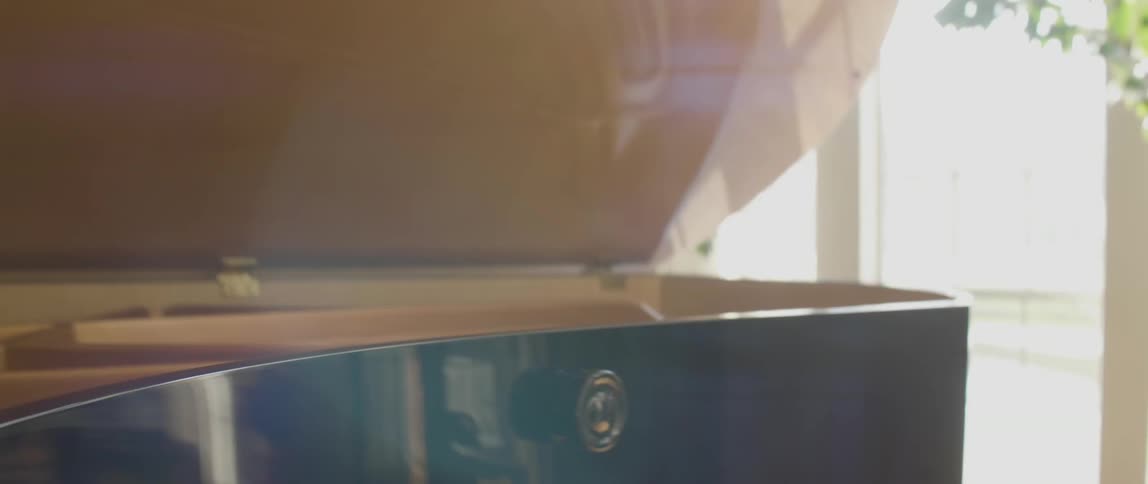 A piano has a reflective surface