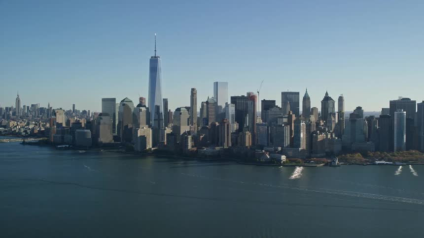 Landscape of skyscrapers at waterfront in a metropolis at midday