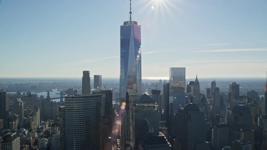 The city view on a sunny day with skyscrapers and tower building