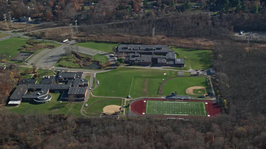 Aerial of sports fields in a suburban neighborhood