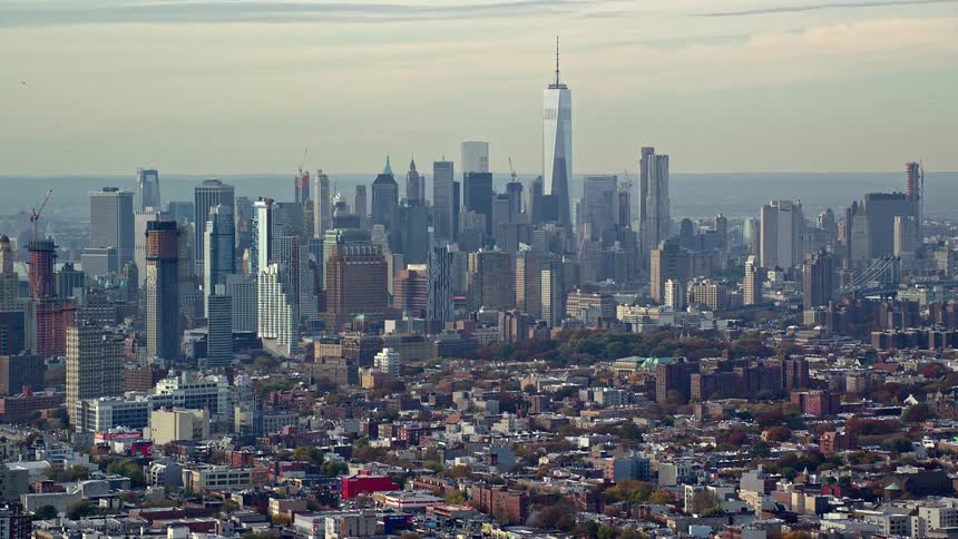 Aerial of new york city skyscrapers surrounding one world trade center