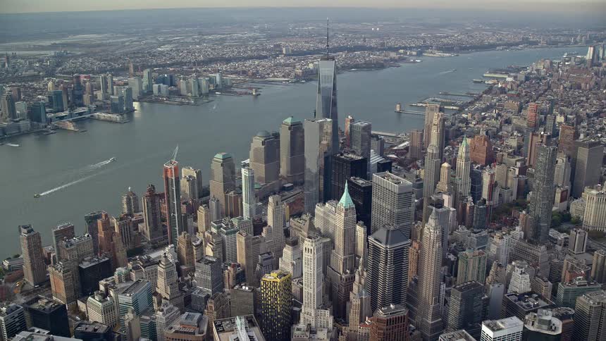 Aerial view of a metropolis with waterfront skyscrapers