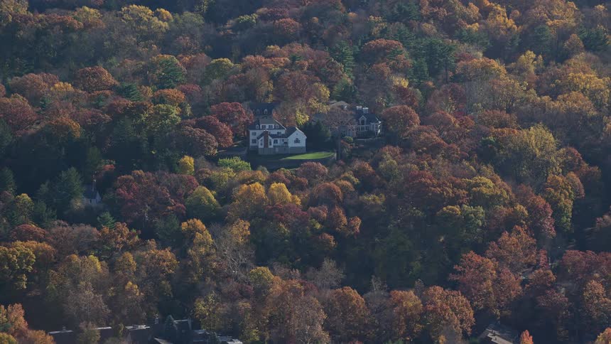 A building surrounded by trees in a rural setting