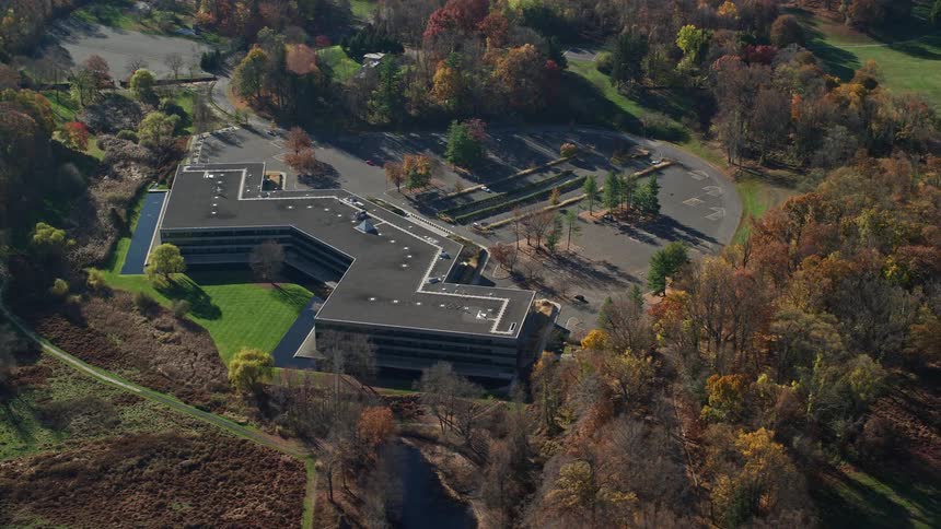 Aerial panorama of a complex amidst a natural environment