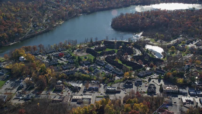 Aerial view of a town next to a lake
