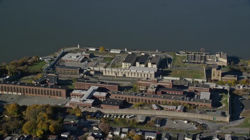 Aerial view of a residential neighborhood next to waterfront buildings