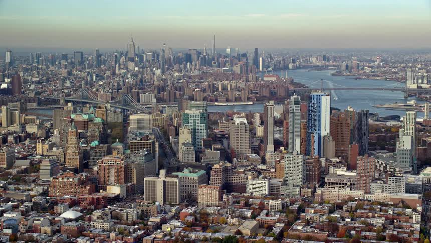 Aerial view of skyscrapers by the sea
