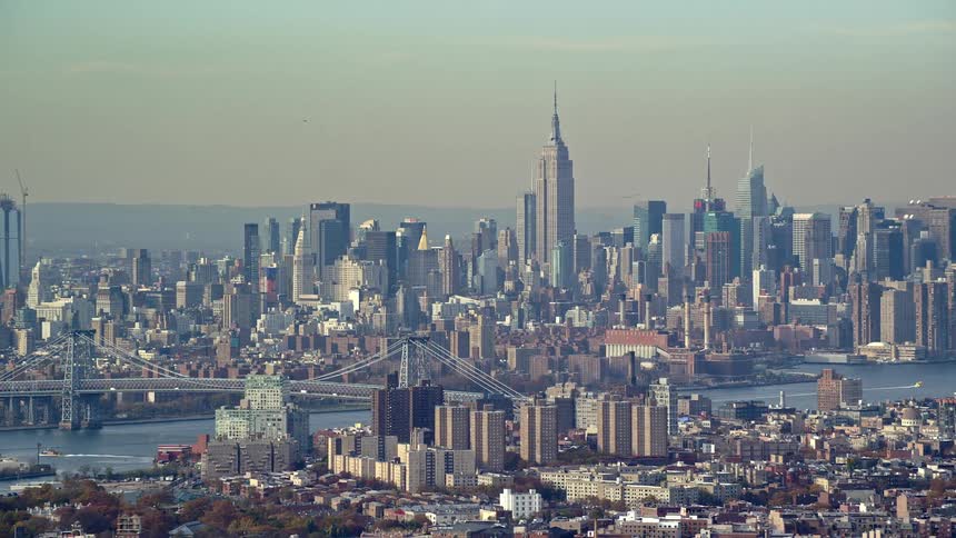 Aerila view of new york city skylineand bridges during the day