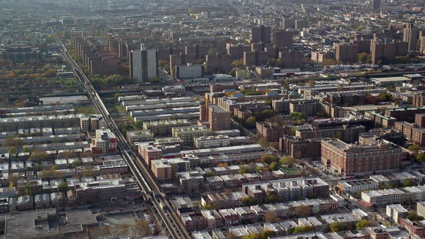 Aerial view of a suburb with houses and apartments in the morning