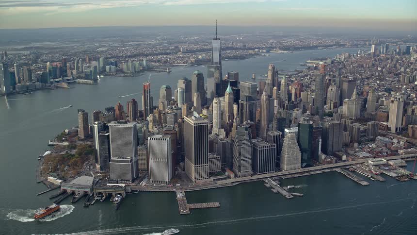 Aerial view of skyscrapers in a metropolis by the seaside